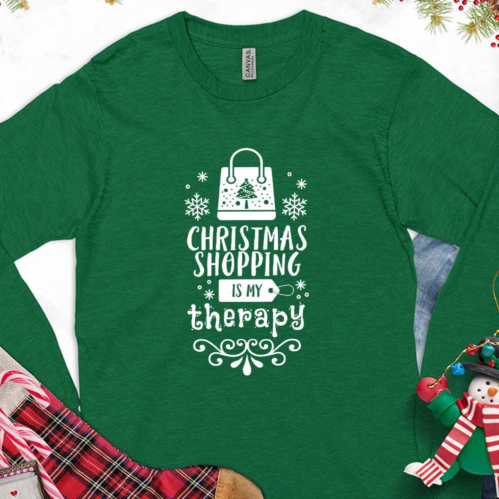 Christmas Shopping Is My Therapy Version 1 Long Sleeves Kelly - Graphic long sleeve tee with "Christmas Shopping Is My Therapy" slogan surrounded by festive snowflake designs.