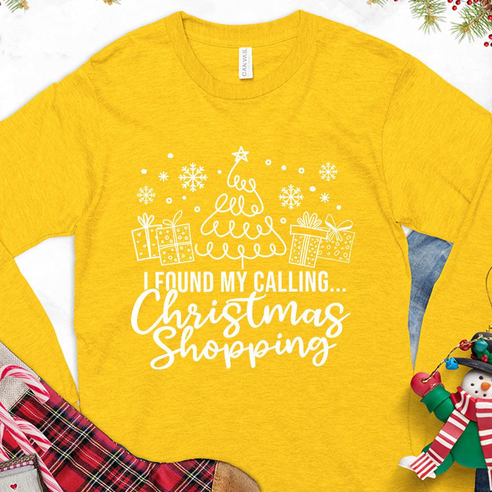 I Found My Calling Christmas Shopping Version 1 Long Sleeves Gold - Festive long-sleeved tee with Christmas shopping theme, cheerful holiday design, and snowflakes.