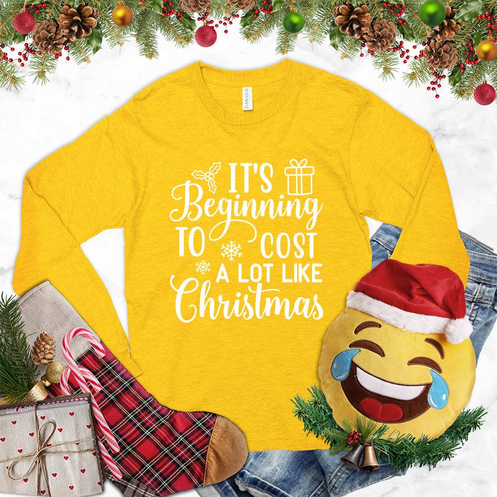 It's Beginning To Cost A Lot Like Christmas Version 2 Long Sleeves Gold - Festive long sleeve shirt with humorous Christmas spending quote and holiday design elements
