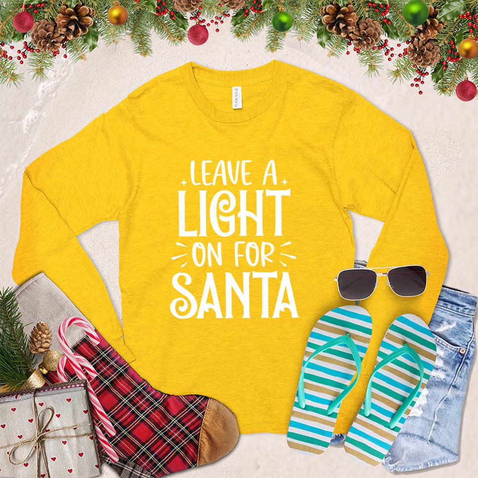 Leave A Light On For Santa Long Sleeves Gold - Festive long sleeve shirt with 'Leave A Light On For Santa' print for holiday celebrations