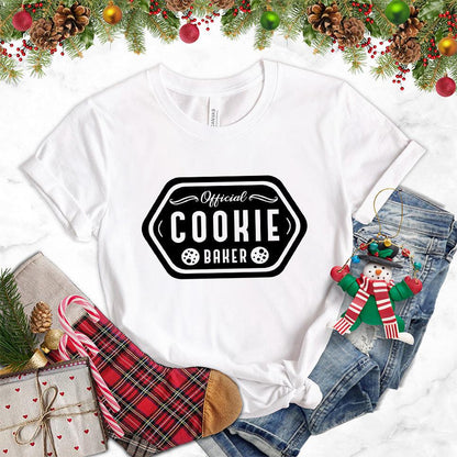 Official Cookie Baker T-Shirt White - Graphic tee with 'Official Cookie Baker' logo in a festive kitchen setting