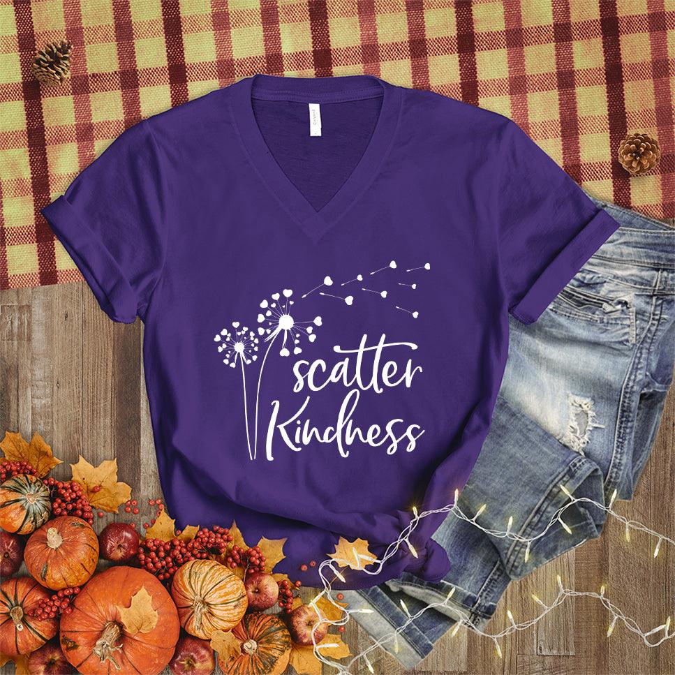 Scatter Kindness V-Neck Team Purple - Scatter Kindness slogan on v-neck t-shirt with dandelion design conveying positivity and style.