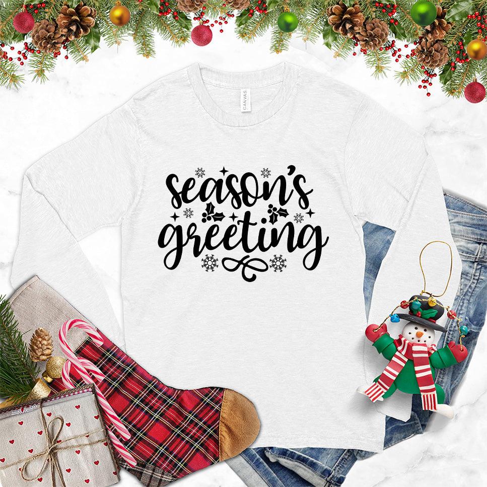 Season's Greeting Long Sleeves White - Cozy long sleeve tee with festive 'Season's Greeting' and snowflakes design, ideal for holiday celebrations.