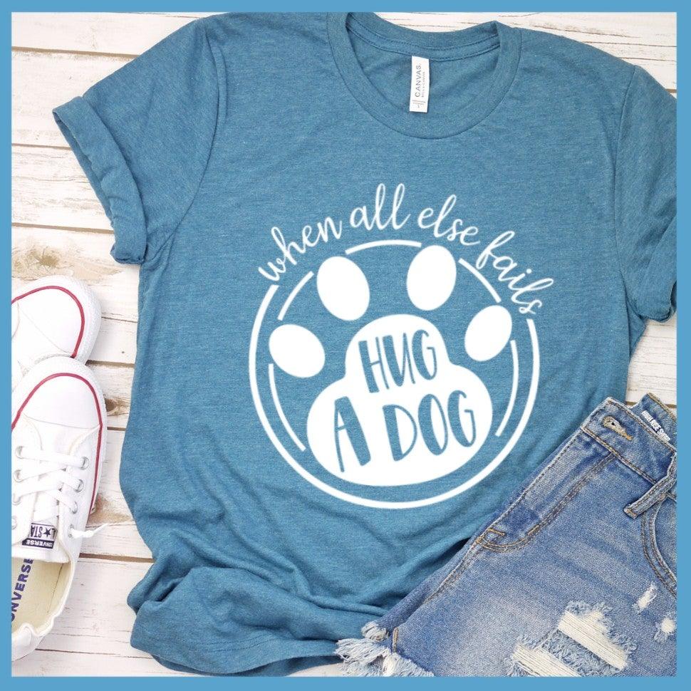 When All Else Fails Hug A Dog T-Shirt Heather Deep Teal - Graphic tee with "When All Else Fails Hug A Dog" slogan, embodying pet lovers' spirit.