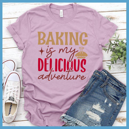 Baking Is My Delicious Adventure T-Shirt Colored Edition Lilac - Illustrated graphic t-shirt with 'Baking is my Delicious Adventure' quote