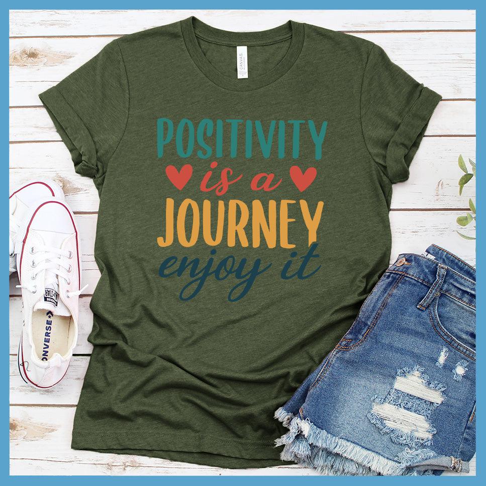 Positivity Is A Journey Enjoy It T-Shirt Colored Edition Military Green - Inspirational quote t-shirt with 'Positivity is a Journey Enjoy It' message.