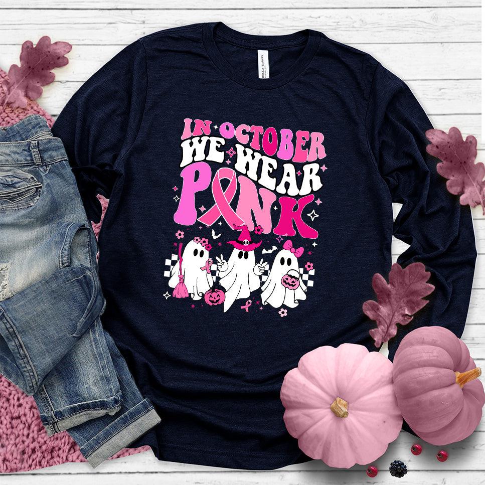 In October We Wear Pink Long Sleeves Colored Edition Navy - "In October We Wear Pink" long sleeve t-shirt with playful graphics for awareness.