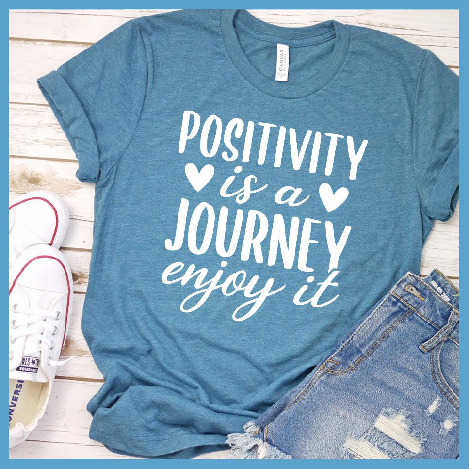 Positivity Is A Journey Enjoy It T-Shirt Colored Edition Heather Deep Teal - Inspirational quote t-shirt with 'Positivity is a Journey Enjoy It' message.