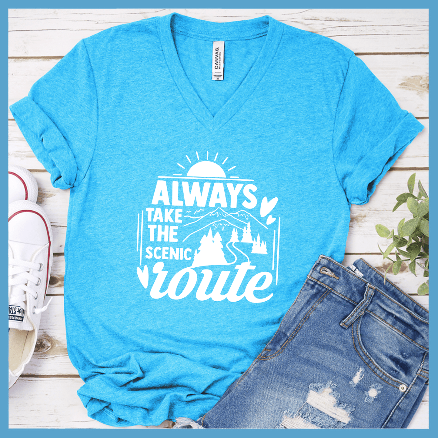 Always Take The Scenic Route V-neck Neon Blue - "Always Take The Scenic Route" graphic V-neck t-shirt with mountain and sunburst design.