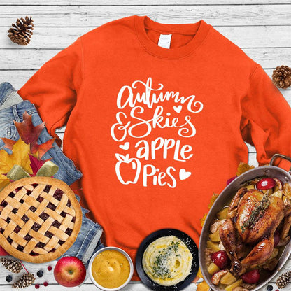 Autumn & Skies Apple Pies Sweatshirt Orange - Comfy sweatshirt with autumn-themed design featuring script & apple graphic.