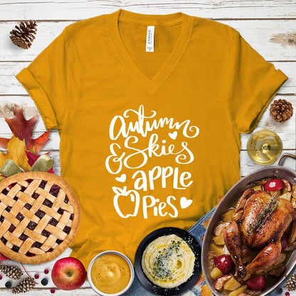 Autumn & Skies Apple Pies V-Neck Mustard - Whimsical v-neck tee with "Autumn & Skies Apple Pies" script, perfect for fall fashion enthusiasts.
