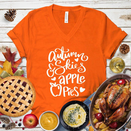 Autumn & Skies Apple Pies V-Neck Orange - Whimsical v-neck tee with "Autumn & Skies Apple Pies" script, perfect for fall fashion enthusiasts.