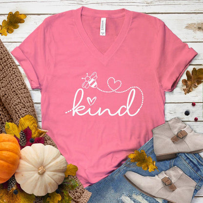 Bee Kind V-Neck Neon Pink - Bee Kind script on V-neck tee with heart and bee details for positive fashion statement.