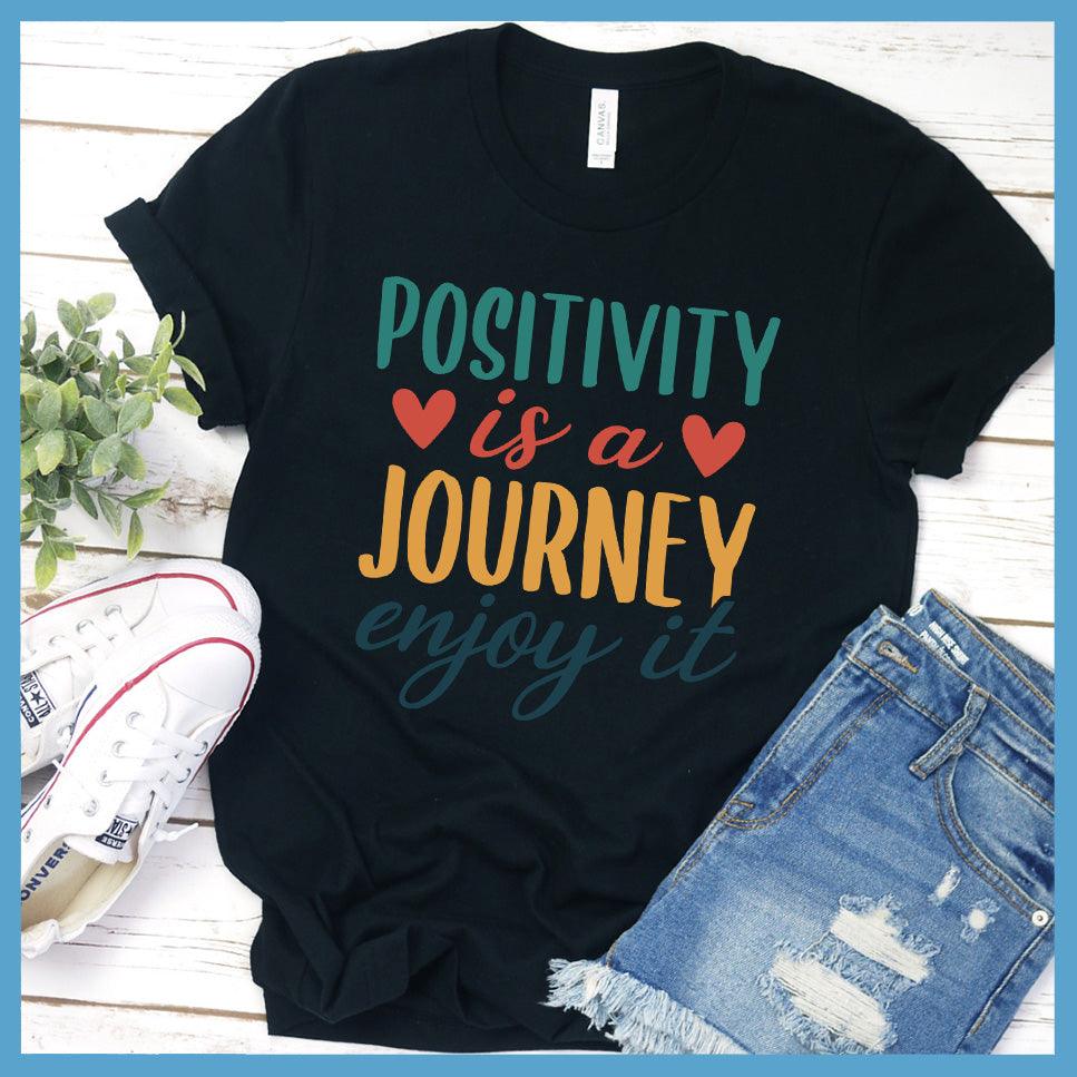 Positivity Is A Journey Enjoy It T-Shirt Colored Edition Black - Inspirational quote t-shirt with 'Positivity is a Journey Enjoy It' message.