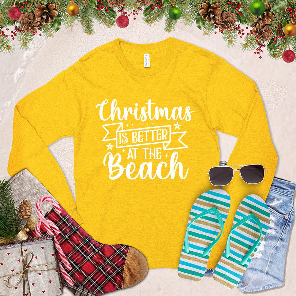 Christmas Is Better At The Beach Long Sleeves Gold - Long sleeve tee with festive "Christmas is Better at the Beach" motif for holiday cheer.