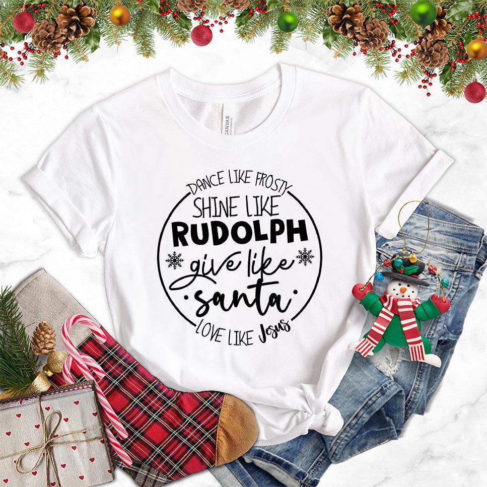 Dance Like Frosty Shine Like Rudolph Give Like Santa Love Like Jesus T-Shirt White - Holiday-themed T-shirt with inspirational Christmas phrases and snowflake graphics