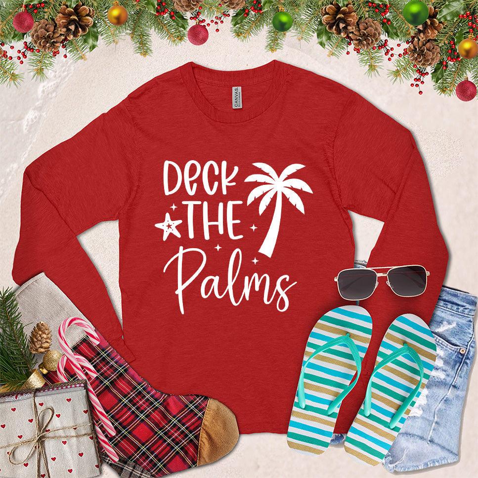 Deck The Palms Long Sleeves Red - Trendy long sleeve shirt featuring a festive "Deck The Palms" graphic, perfect for seasonal celebrations.