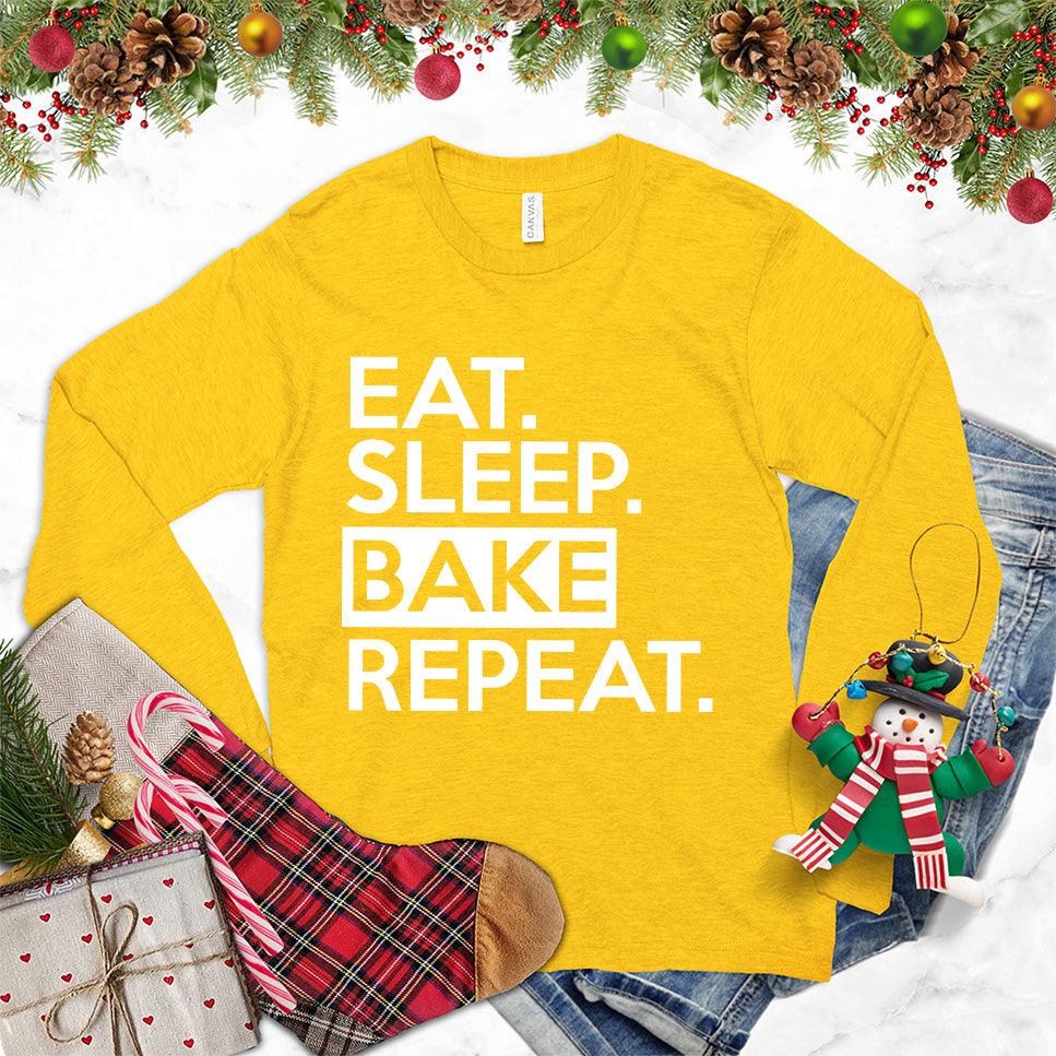 Eat Sleep Bake Repeat Long Sleeves Gold - Fun long-sleeve shirt with "Eat Sleep Bake Repeat" slogan for baking lovers