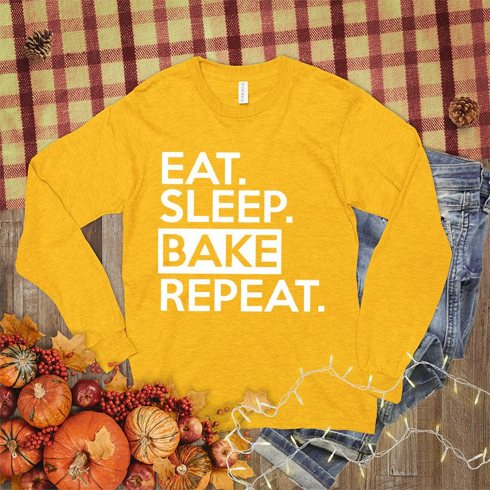 Eat Sleep Bake Repeat Long Sleeves Mustard - Fun long-sleeve shirt with "Eat Sleep Bake Repeat" slogan for baking lovers