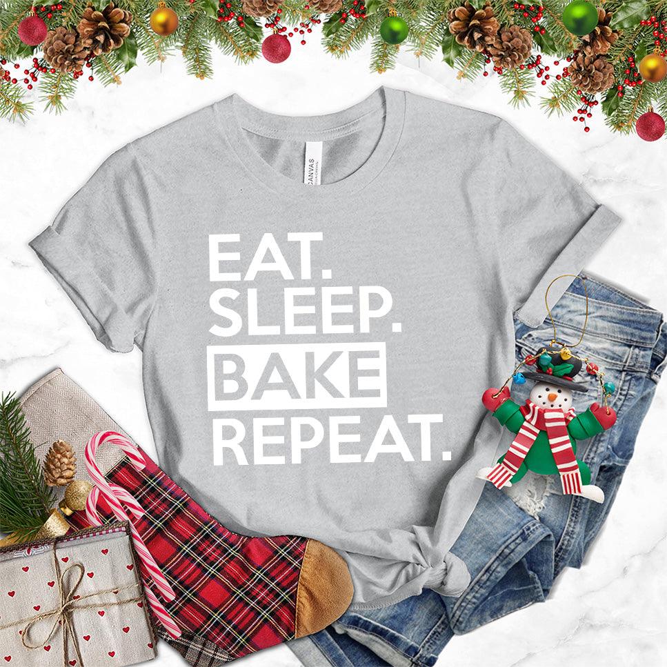 Eat Sleep Bake Repeat T-Shirt Athletic Heather - Illustration of fun 'Eat Sleep Bake Repeat' phrase on casual t-shirt for baking fans