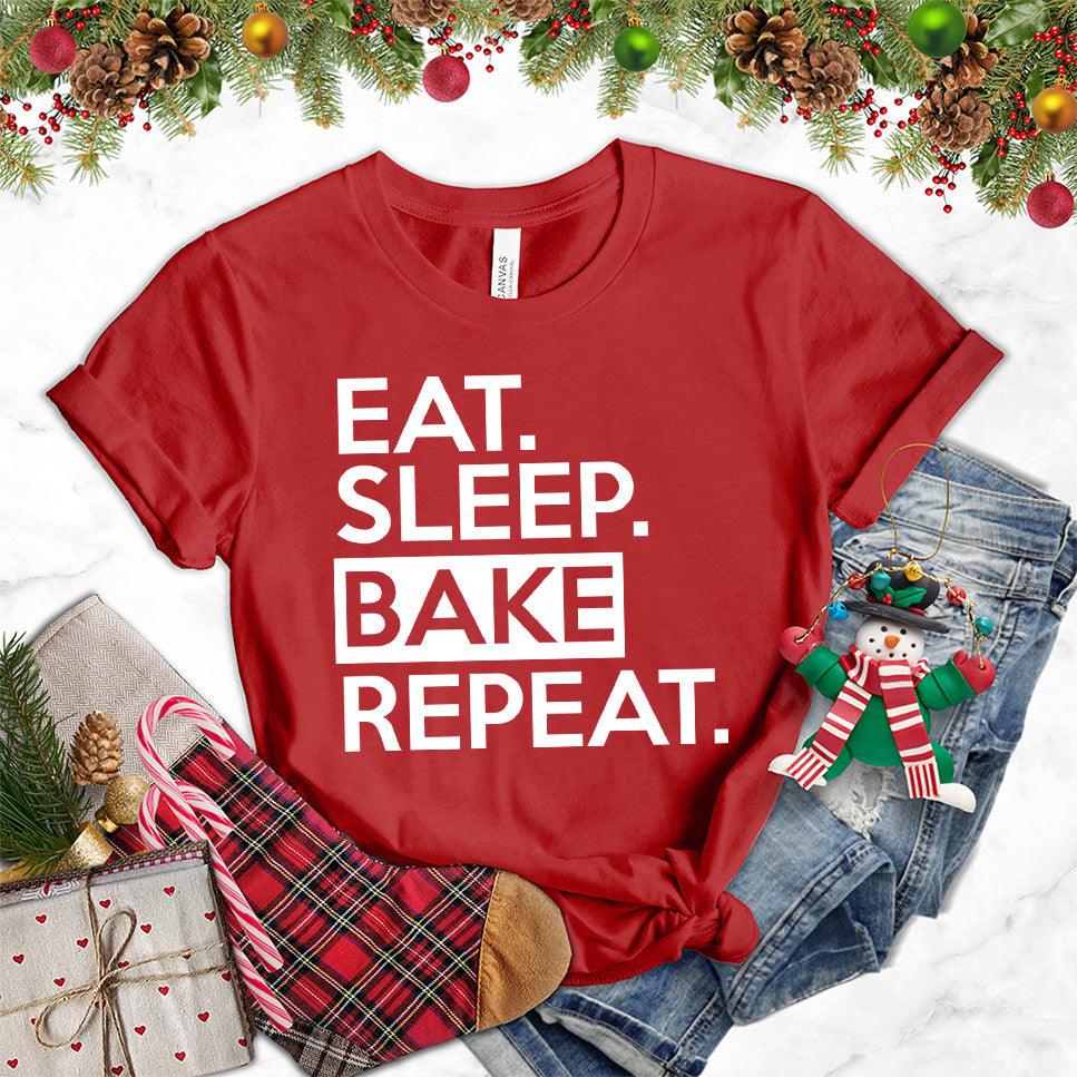 Eat Sleep Bake Repeat T-Shirt Canvas Red - Illustration of fun 'Eat Sleep Bake Repeat' phrase on casual t-shirt for baking fans