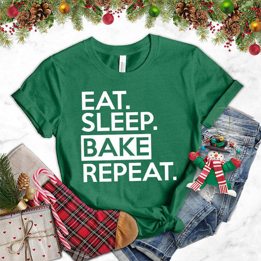 Eat Sleep Bake Repeat T-Shirt Heather Grass Green - Illustration of fun 'Eat Sleep Bake Repeat' phrase on casual t-shirt for baking fans