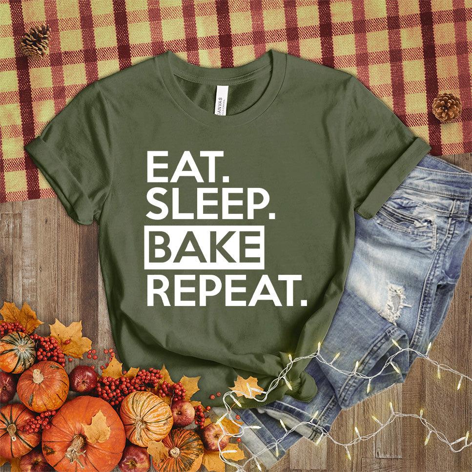 Eat Sleep Bake Repeat T-Shirt Military Green - Illustration of fun 'Eat Sleep Bake Repeat' phrase on casual t-shirt for baking fans