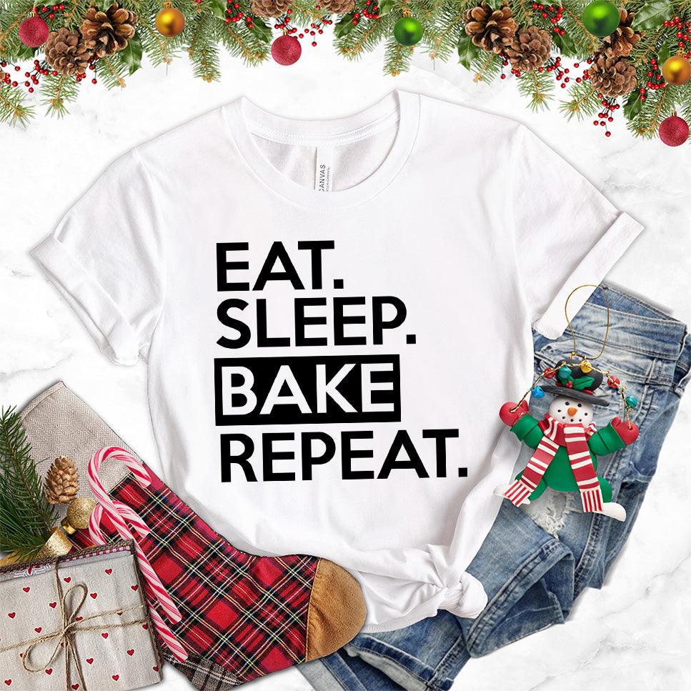 Eat Sleep Bake Repeat T-Shirt White - Illustration of fun 'Eat Sleep Bake Repeat' phrase on casual t-shirt for baking fans