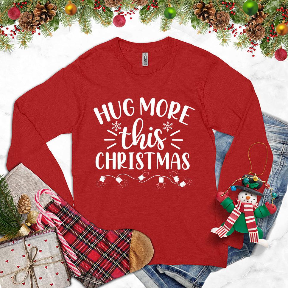 Hug More This Christmas Long Sleeves Red - Festive long-sleeve tee with 'Hug More This Christmas' design, perfect for holiday warmth and style