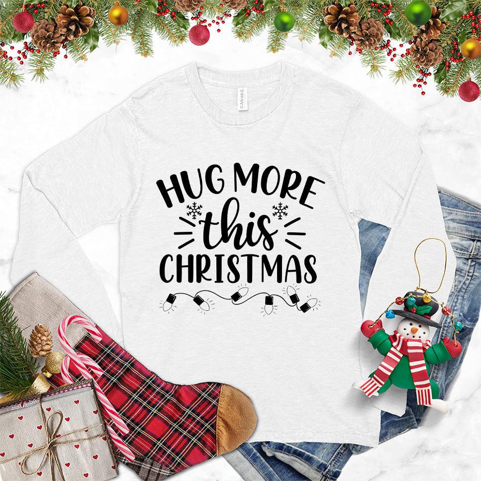 Hug More This Christmas Long Sleeves White - Festive long-sleeve tee with 'Hug More This Christmas' design, perfect for holiday warmth and style