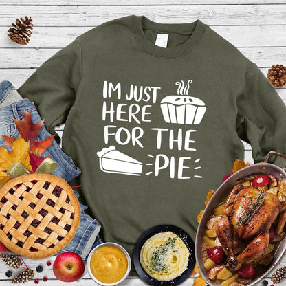 I'm Just Here for the Pie Sweatshirt Military Green - "I'm Just Here for the Pie" fun statement on a cozy sweatshirt for dessert lovers.