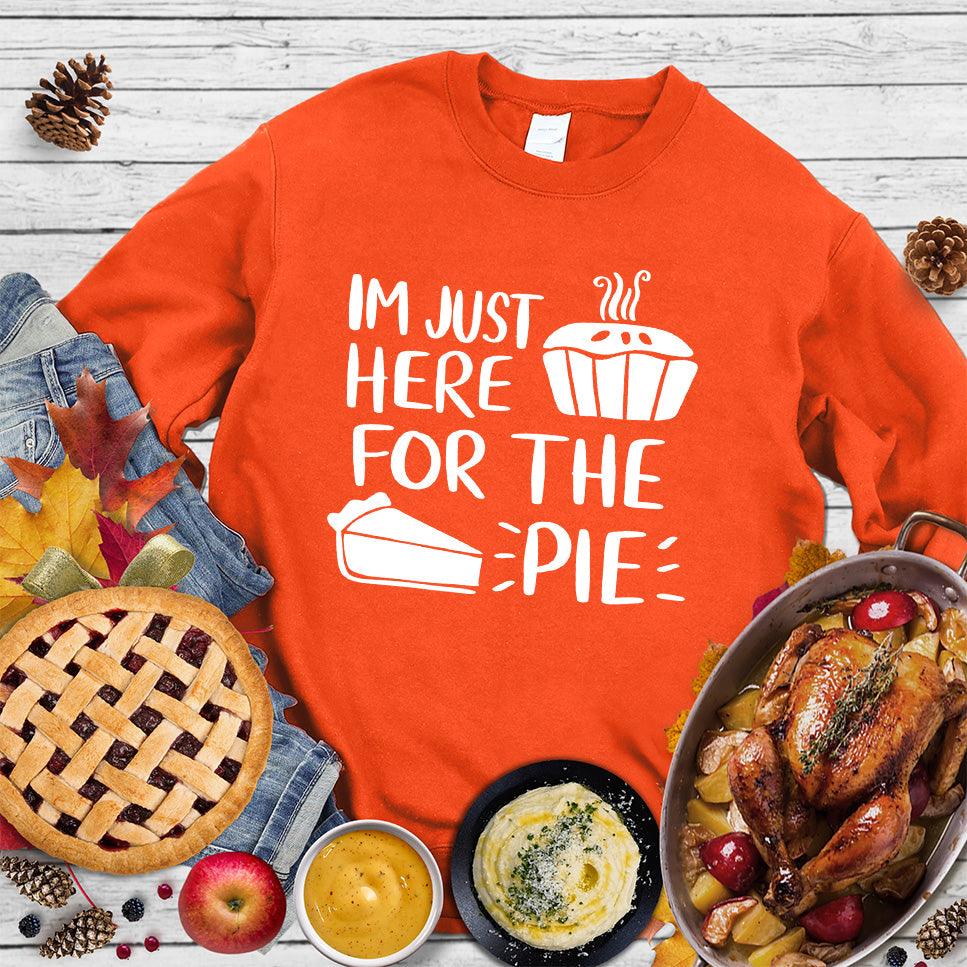 I'm Just Here for the Pie Sweatshirt Orange - "I'm Just Here for the Pie" fun statement on a cozy sweatshirt for dessert lovers.