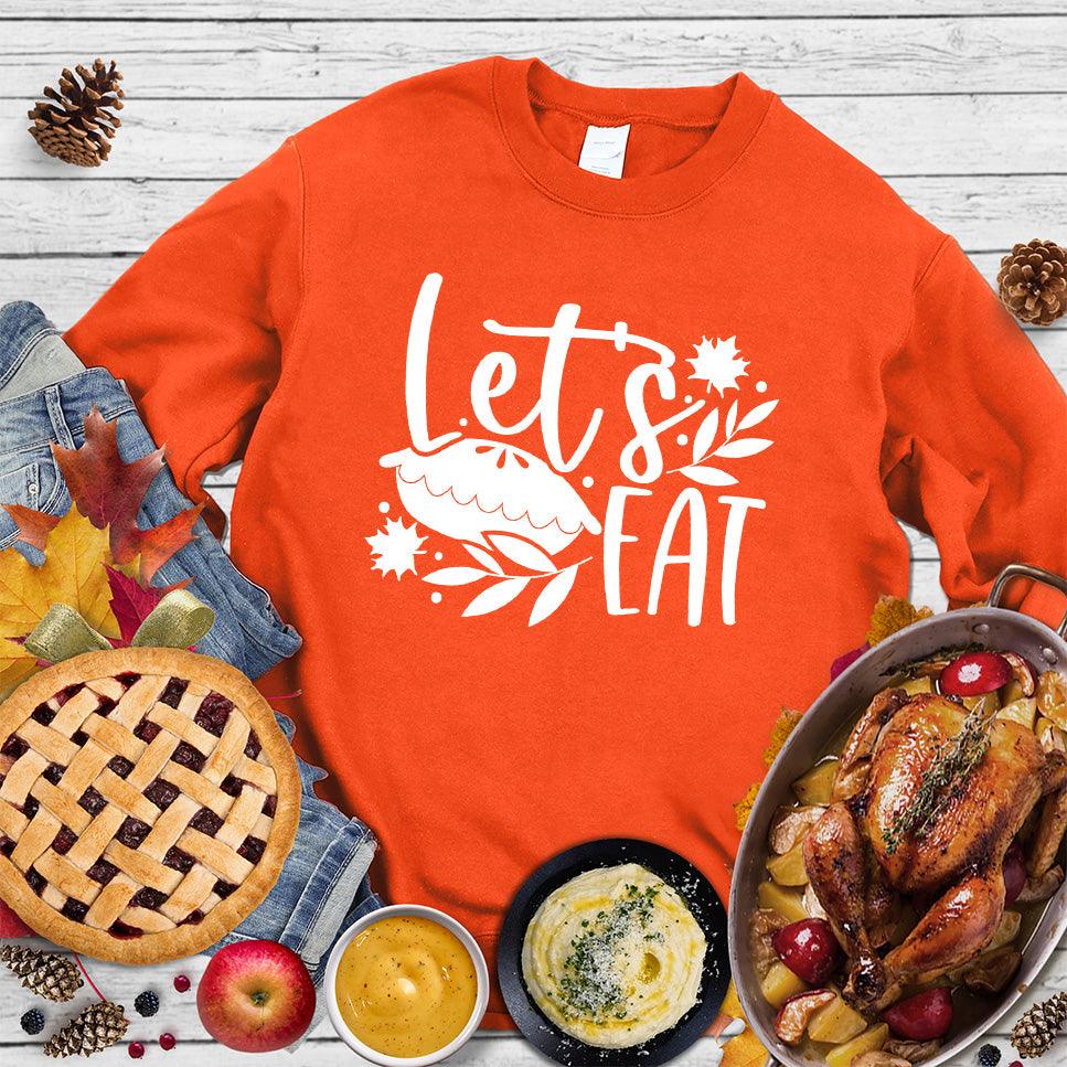Let's Eat Pie Sweatshirt Orange - Comfy sweatshirt with 'Let's Eat' and pie graphics, perfect for foodie fashionistas
