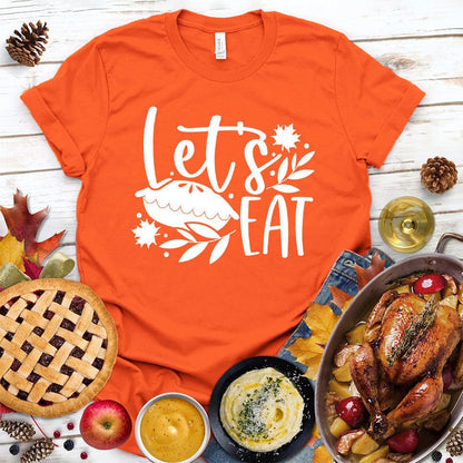 Let's Eat Pie T-Shirt Orange - Graphic tee with playful 'Let's Eat' and pie design, perfect for dessert enthusiasts