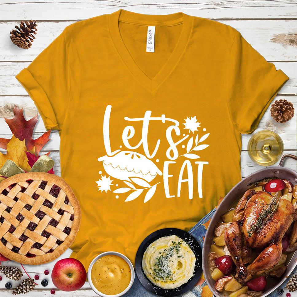 Let's Eat Pie V-Neck Mustard - Graphic tee with 'Let's Eat' and pie design, perfect for food and fun lovers.