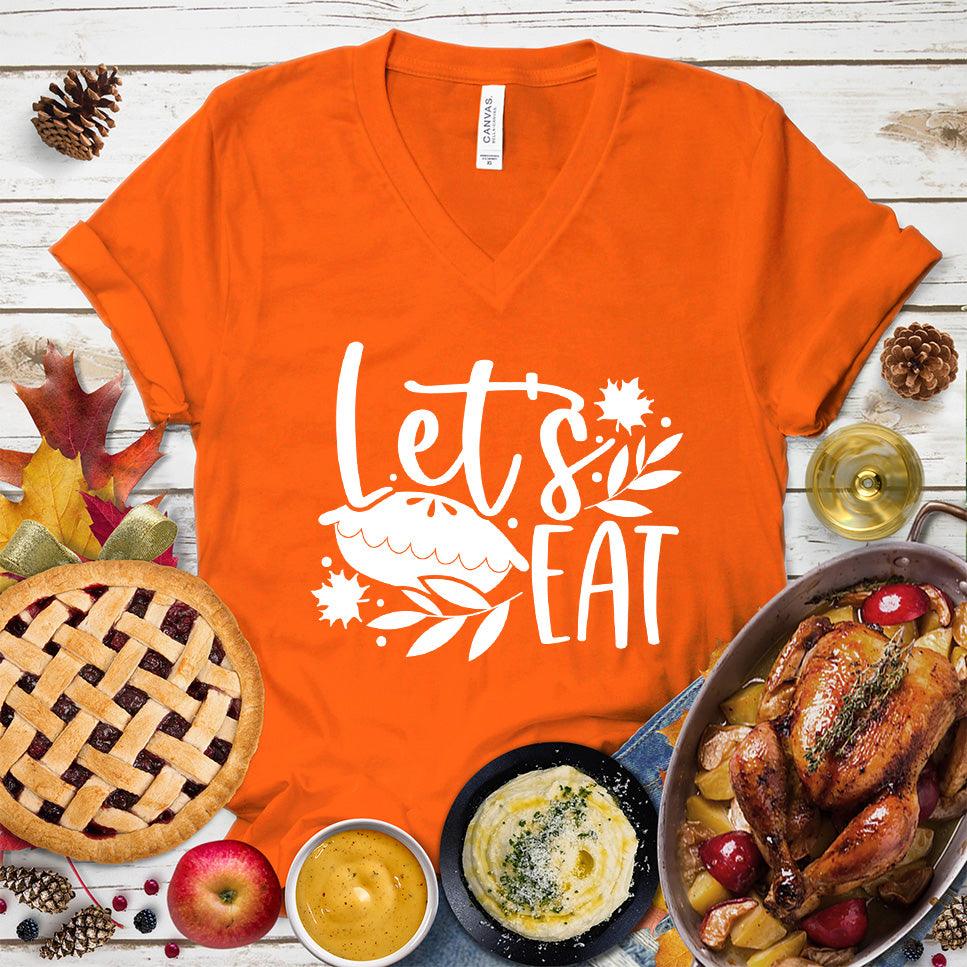 Let's Eat Pie V-Neck Orange - Graphic tee with 'Let's Eat' and pie design, perfect for food and fun lovers.