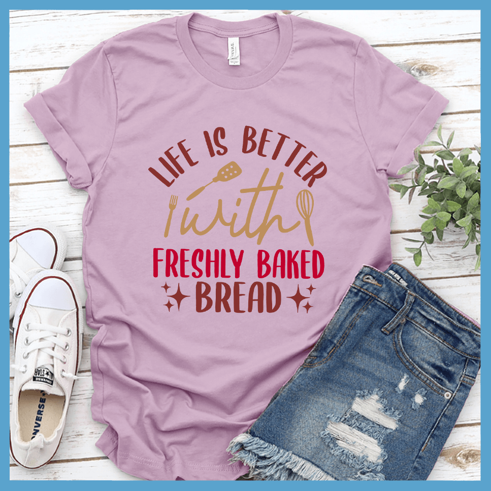Life Is Better With Freshly Baked Bread T-Shirt Colored Edition Lilac - Graphic tee with 'Life Is Better With Freshly Baked Bread' design featuring whisk and rolling pin