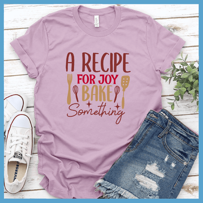 A Recipe For Joy Bake Something T-Shirt Colored Edition Lilac - Fun culinary-themed graphic tee with joyful baking design, perfect for casual wear or kitchen adventures.