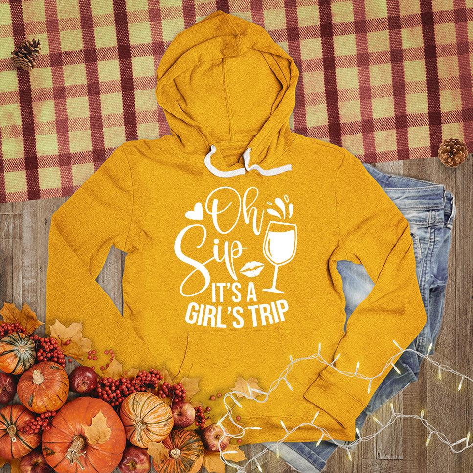 Oh Sip It's A Girl's Trip Hoodie Heather Mustard - Whimsical hoodie with playful girl's trip quote, perfect for travel and friendship celebrations.