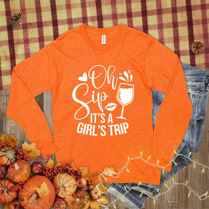 Oh Sip It's A Girl's Trip Long Sleeves Orange - Long sleeve shirt with 'Oh Sip It's A Girl's Trip' text and wine glass design, perfect for group travel and bonding.