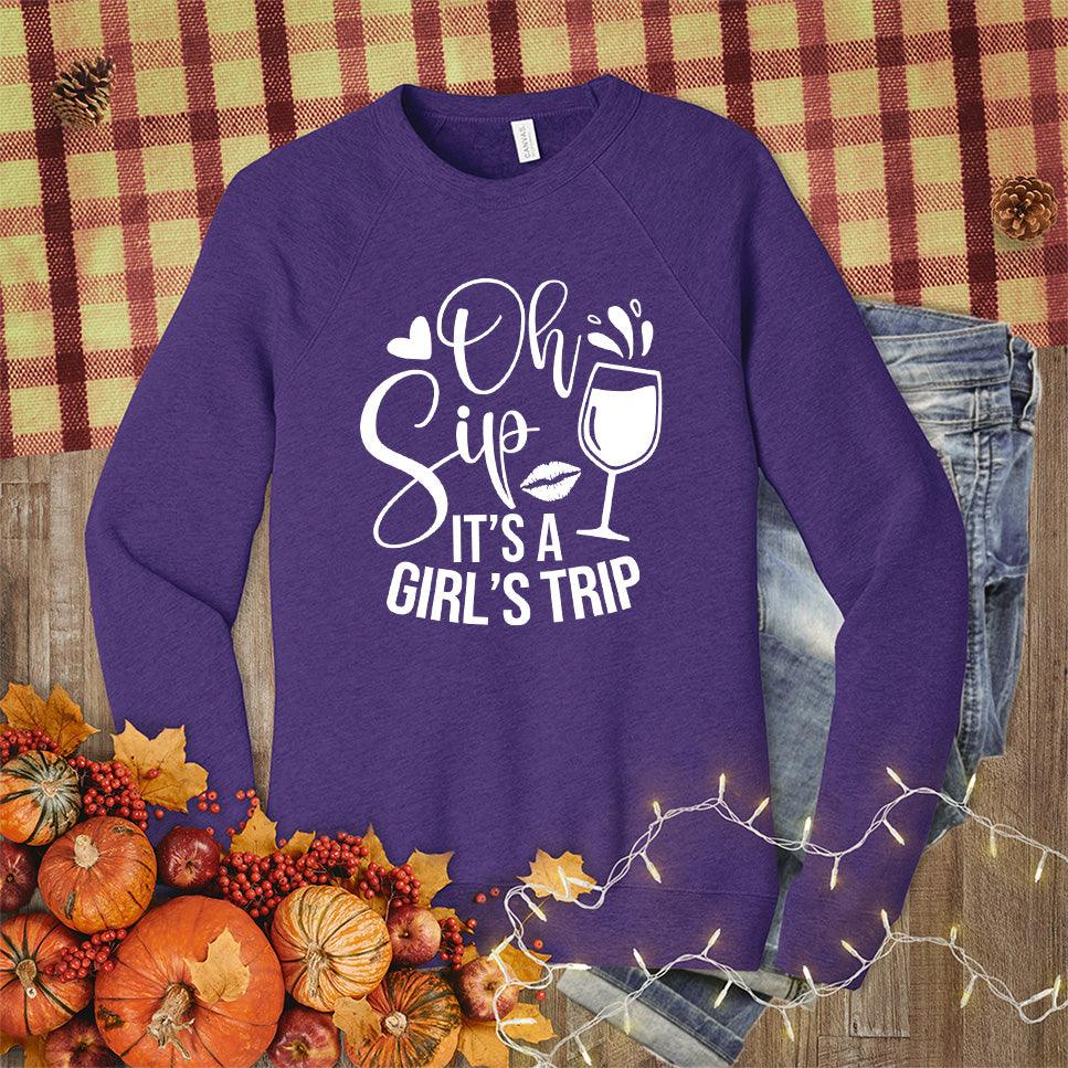 Oh Sip It's A Girl's Trip Sweatshirt Team Purple - Graphic sweatshirt featuring fun text "Oh Sip It's A Girl's Trip" and wine glass design.