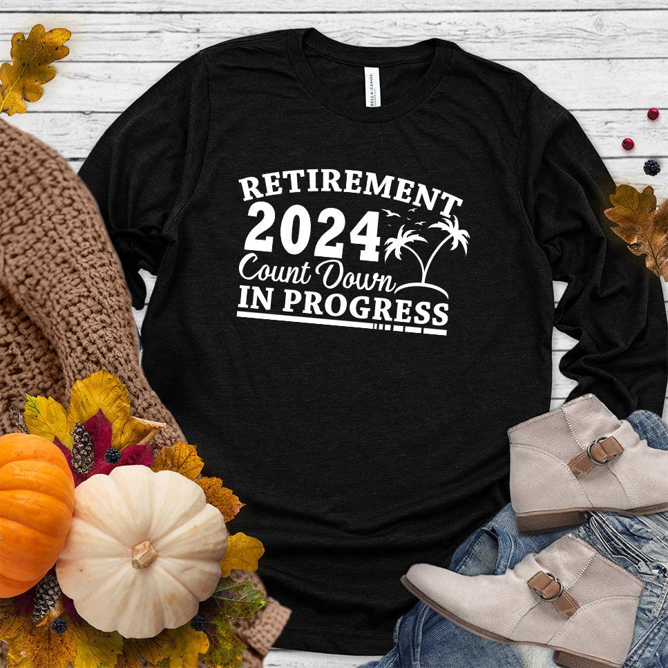 Retirement 2024 Countdown In Progress Long Sleeves Black - "Retirement 2024 Countdown" graphic long sleeve t-shirt with fun beach design.