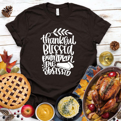 Thankful Blessed Pumpkin Pie Obsessed T-Shirt Brown - Thanksgiving-themed "Thankful Blessed Pumpkin Pie Obsessed" t-shirt with festive design