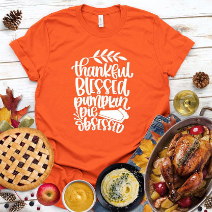Thankful Blessed Pumpkin Pie Obsessed T-Shirt Orange - Thanksgiving-themed "Thankful Blessed Pumpkin Pie Obsessed" t-shirt with festive design