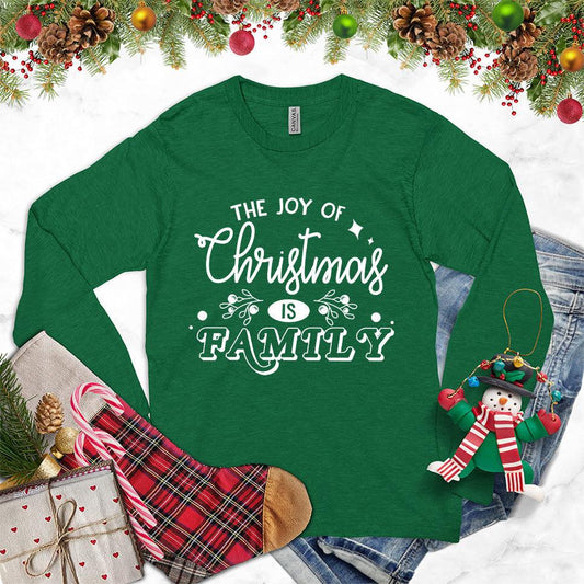 The Joy Of Christmas Is Family Long Sleeves Kelly - Festive long sleeve tee featuring "The Joy Of Christmas is Family" message with holiday designs.