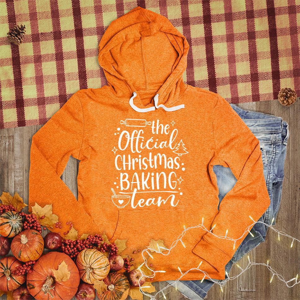The Official Christmas Baking Team Hoodie Orange - Festive hoodie with Christmas baking theme design, perfect for holiday cooking.