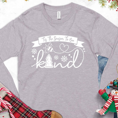 Tis The Season To Bee Kind Version 1 Long Sleeves Storm - Holiday-inspired long sleeve tee with Bee Kind phrase and festive graphics