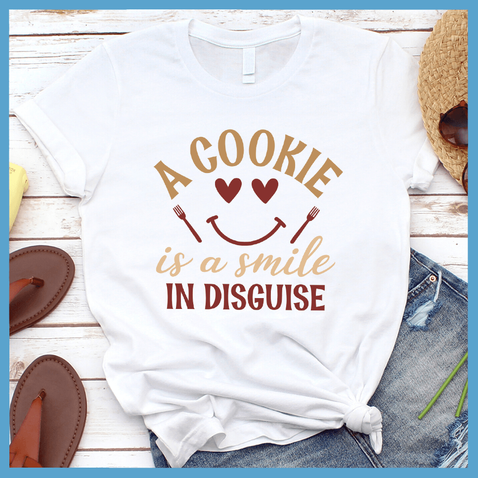 A Cookie Is A Smile In Disguise T-Shirt Colored Edition White - Cheerful t-shirt with quote about cookies and happiness, ideal for bakers and style enthusiasts.