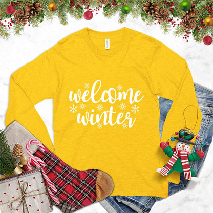 Welcome Winter Long Sleeves Gold - Stylish unisex long sleeve shirt with "Welcome Winter" script and snowflake designs, ideal for seasonal fashion.