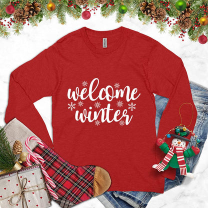 Welcome Winter Long Sleeves Red - Stylish unisex long sleeve shirt with "Welcome Winter" script and snowflake designs, ideal for seasonal fashion.